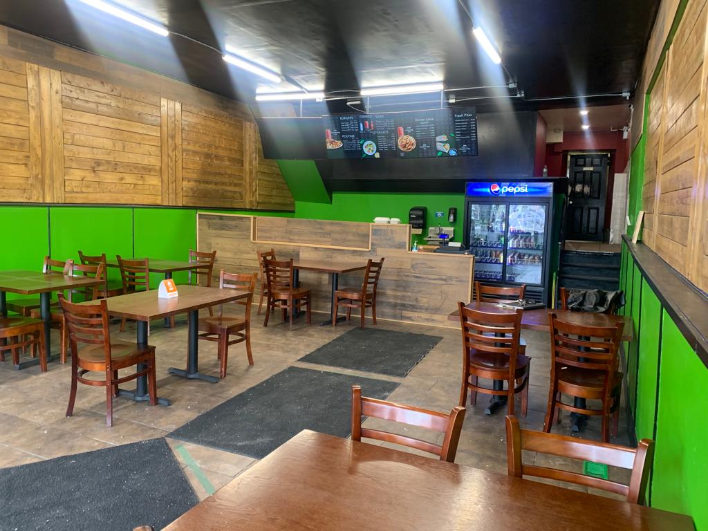 Green Theme with brown table and Chairs