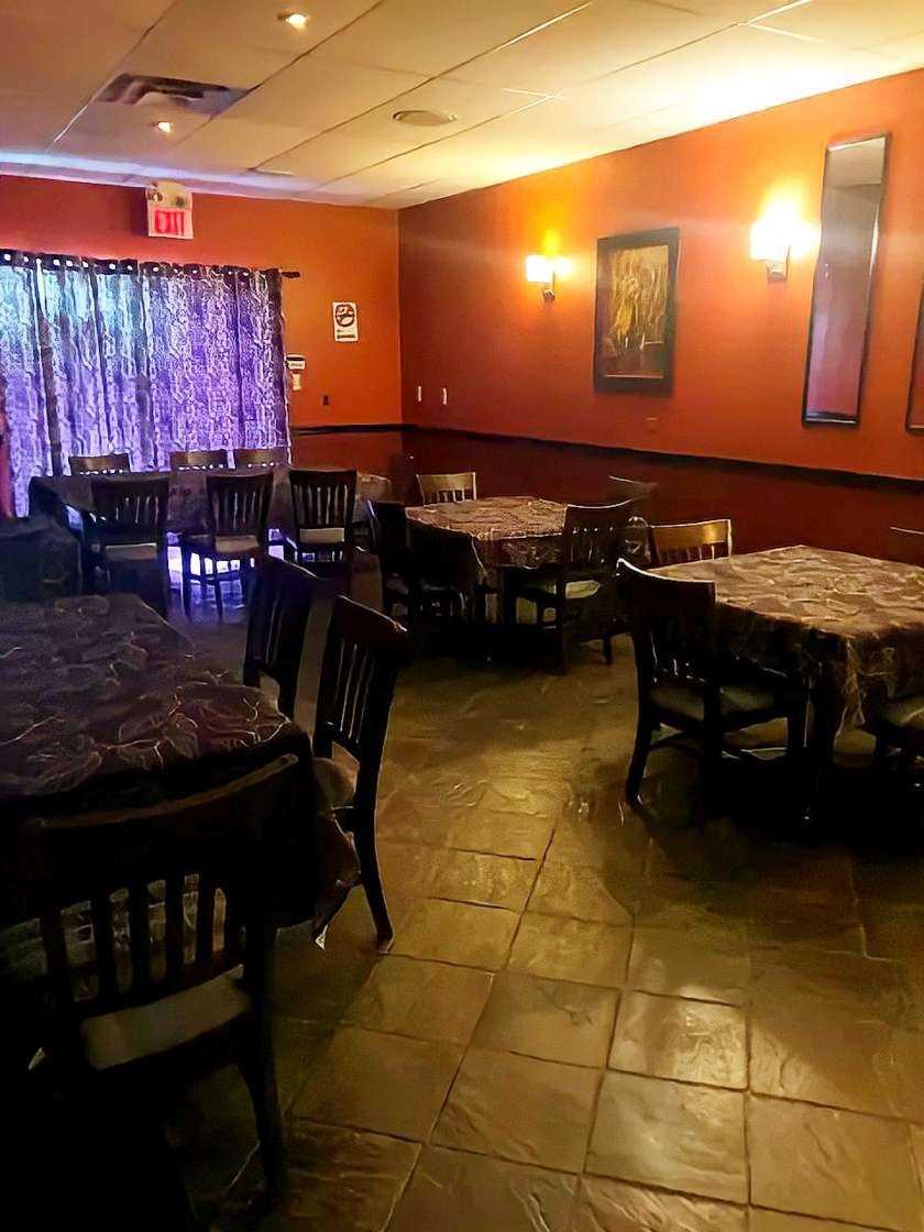 Low light hall image with dinning area